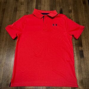 New without tags.  Kids Under Armour Polo shirt.  Sz YM